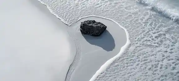 Rock formations on a beach representing natural boundaries